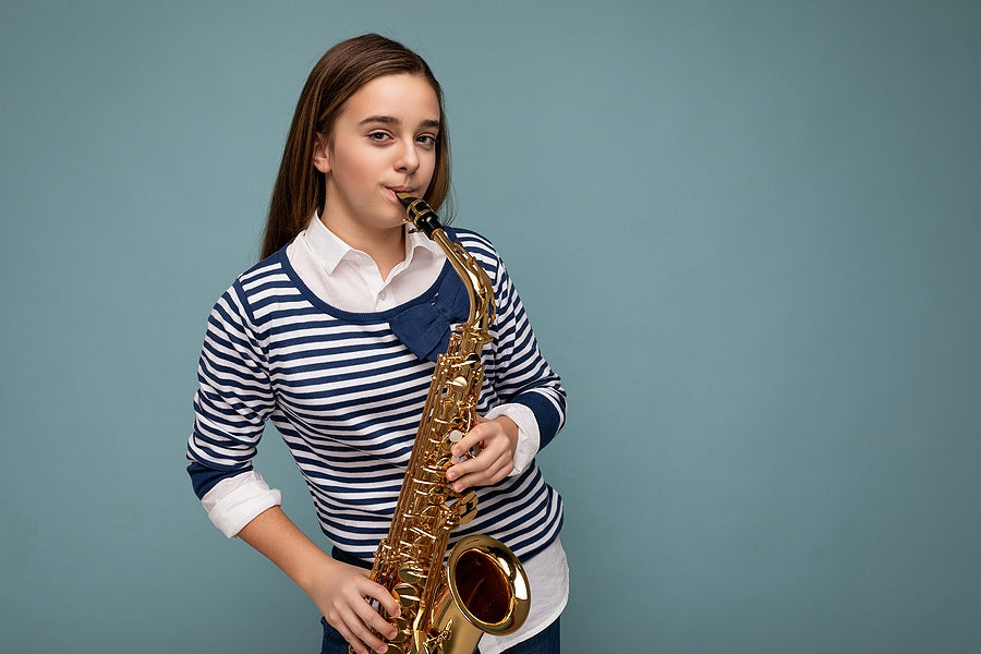girl playing the saxophone