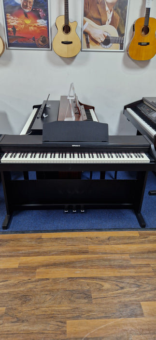 Second Hand Roland RP102 Digital Piano.